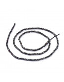 Rondelle faceteado. 2x1,5 mm. GUNMETAL PLATED. 0,6 mm perforación. 220 uds hilo (aproximado).