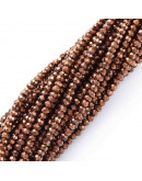 Rondelle faceteado. 2x1,5 mm. COPPER PLATED. 0,6 mm perforación. 220 uds hilo (aproximado).