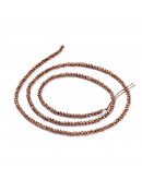 Rondelle faceteado. 2x1,5 mm. COPPER PLATED. 0,6 mm perforación. 220 uds hilo (aproximado).