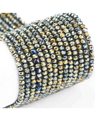 Rondelle faceteado. 2x1,5 mm. GREEN PLATED. 0,6 mm perforación. 220 uds hilo (aproximado).