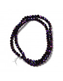 Esfera faceteada. PURPLE PLATED. 4 mm diámetro. 0,5 mm perforación. 100 uds hilo (aproximado).