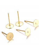 Pin aretes. Acero inoxidable. Color dorado. Pin 0,7 mm. Base 8x0,3 mm. Cierre silicón. 40 unidades. Pin aretes. Acero inoxidable. Color dorado. Pin 0,7 mm. Base 8x0,3 mm. Cierre silicón. 40 unidades.