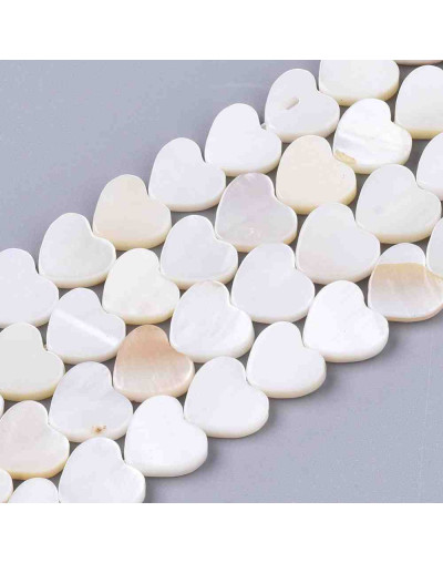 Concha de mar. Corazón. 8x8x2,5 milímetros. 0,80 mm de perforación vertical. 1 unidad.