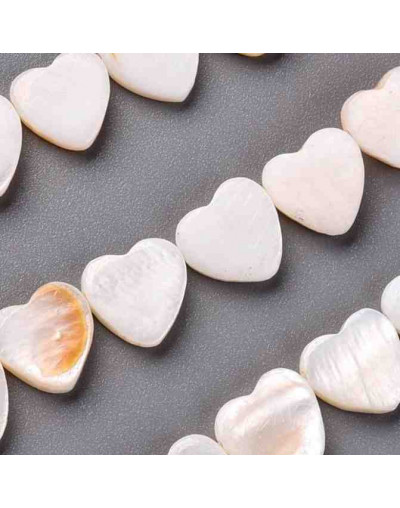 Concha de mar. Corazón. 10x10x3 milímetros. 1 mm de perforación horizontal. 1 unidad.