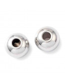 Esfera. Acero inoxidable. Color plateado. 3x2 milímetros. 1,5 mm perforación. 50 unidades.