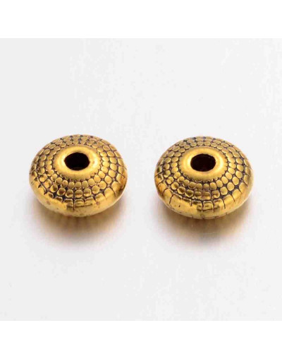 Rondelle (6). Aleación de cobre. Color dorado. 8x4 milímetros. 1,5 mm perforación. 20 unidades.