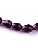 Gota faceteada. Purple. 8x6 milímetros. 1 mm perforación. 65 unidades hilo (aproximado). Gota faceteada. Purple. 8x6 milímetros. 1 mm perforación. 65 unidades hilo (aproximado).