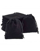 Bolsa de regalo. Terciopelo. Color negro. Cierre con cordón. 90x70 milímetros. 4 unidades. Bolsa de regalo. Terciopelo. Color negro. Cierre con cordón. 90x70 milímetros. 4 unidades.