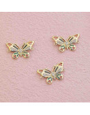 Mariposa. Aleación+Zirconia. Baño 18KGold. 25x16x2 milímetros. 1,5 mm perforación. 1 unidad. Mariposa. Aleación+Zirconia. Baño 18KGold. 25x16x2 milímetros. 1,5 mm perforación. 1 unidad.