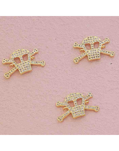 Calavera. Aleación+Zirconia. Baño 18KGold. 15x14x2 milímetros. 1,5 mm perforación. 1 unidad.