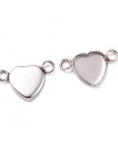 Base Link de Acero. Color plateado. 11x18x9x2 mm. Agujero 2,5 mm. Para trabajos de 9x9 mm. 4 uds. Base Link de Acero. Color plateado. 11x18x9x2 mm. Agujero 2,5 mm. Para trabajos de 9x9 mm. 4 uds.