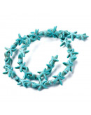 Turquesa sintética. Estrellas de mar. Color azul. 14x14 mm. 1 mm perforación. 35 uds hilo (aprox.).