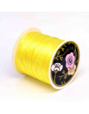 Cordón de nylon. Acabado Satén. 1 mm grosor. Color YELLOW. 80 metros cono. Cordón de nylon. Acabado Satén. 1 mm grosor. Color YELLOW. 80 metros cono.