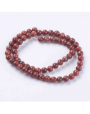 Jásper Sésamo. Rojo oscuro. 10 milímetros diámetro. 1 mm perforación. 35 unidades aproximado. Jásper Sésamo. Rojo oscuro. 10 milímetros diámetro. 1 mm perforación. 35 unidades aproximado.