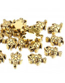 Tortuga. Aleación de cobre. Color oro antiguo. 12,5x9x4 milímetros. 1 mm perforación. 20 unidades.