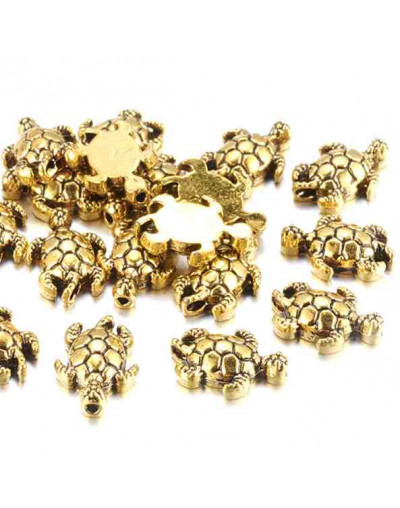 Tortuga. Aleación de cobre. Color oro antiguo. 12,5x9x4 milímetros. 1 mm perforación. 20 unidades.