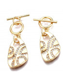 Cierre de barra. Forma irregular. Aleación+Zirconia. Baño 18KGold. 34 milímetros. Barra 13 mm. 1 set