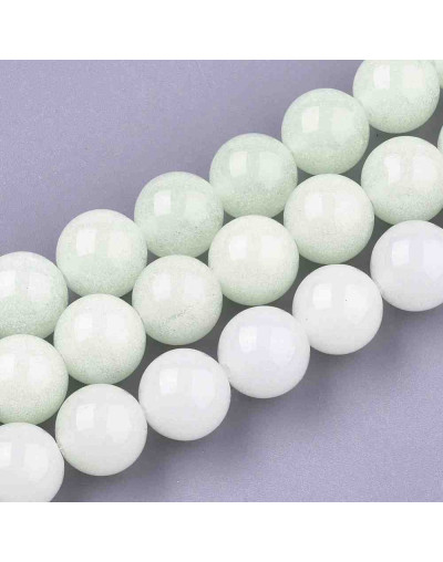 Piedra sintética. Fluorescente. 08 mm diámetro. 1 mm perforación. 48 unidades hilo (aproximado)