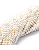 Concha de mar. Esfera color perla. 4 milímetros. 1 mm perforación. 95 uds hilo (aprox).