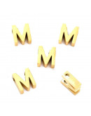 Letra "M". Acero inoxidable. Color dorado. 8x2.5 milímetros. 2 mm perforación. 1 unidad. Letra "M". Acero inoxidable. Color dorado. 8x2.5 milímetros. 2 mm perforación. 1 unidad.