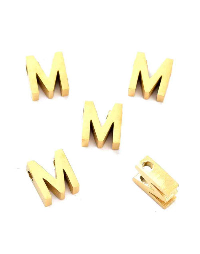 Letra "M". Acero inoxidable. Color dorado. 8x2.5 milímetros. 2 mm perforación. 1 unidad.