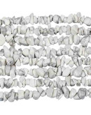 Chips 5-8 milímetros. Howlite. 0,8 mm perforación. 250 unidades hilo aproximado. 1 hilo.