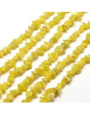 Chips 5-8 milímetros. Jade Limón. 0,8 mm perforación. 250 unidades hilo aproximado. 1 hilo.