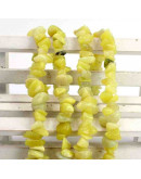 Chips 5-8 milímetros. Jade Limón. 0,8 mm perforación. 250 unidades hilo aproximado. 1 hilo.