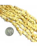 Chips 5-8 milímetros. Jade Yellow. 0,8 mm perforación. 250 unidades hilo aproximado. 1 hilo.