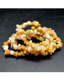 Chips 5-8 milímetros. Jade Yellow. 0,8 mm perforación. 250 unidades hilo aproximado. 1 hilo.