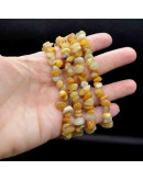 Chips 5-8 milímetros. Jade Yellow. 0,8 mm perforación. 250 unidades hilo aproximado. 1 hilo.