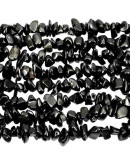 Chips 5-8 milímetros. Obsidiana. 0,8 mm perforación. 250 unidades hilo aproximado. 1 hilo.