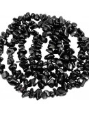 Chips 5-8 milímetros. Obsidiana. 0,8 mm perforación. 250 unidades hilo aproximado. 1 hilo.