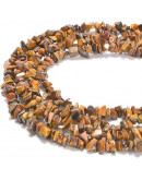 Chips 5-8 milímetros. Ojo de Tigre. Amarillo. 0,8 mm perforación. 250 uds hilo aproximado. 1 hilo.