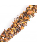 Chips 5-8 milímetros. Ojo de Tigre. Amarillo. 0,8 mm perforación. 250 uds hilo aproximado. 1 hilo.