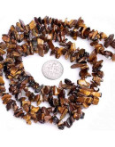 Chips 5-8 milímetros. Ojo de Tigre. Oscuro. 0,8 mm perforación. 250 uds hilo aproximado. 1 hilo.