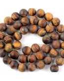 Ojo de Tigre. Mate. 06 milímetros diámetro. 1 mm perforación. 60 unidades hilo aproximado. 1 hilo. Ojo de Tigre. Mate. 06 milímetros diámetro. 1 mm perforación. 60 unidades hilo aproximado. 1 hilo.