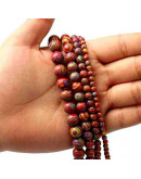 Malaquita sintética. Colorfull. 04 mm diámetro. 0,6 mm perforación. 90 uds hilo aprox. 1 hilo.