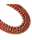 Malaquita sintética. Colorfull. 06 mm diámetro. 1 mm perforación. 60 uds hilo aprox. 1 hilo.