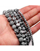 Malaquita sintética. Black. 08 mm diámetro. 1 mm perforación. 45 unidades hilo aprox. 1 hilo.