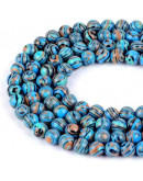 Malaquita sintética. Tonos azules. 10 mm diámetro. 1 mm perforación. 35 uds hilo aprox. 1 hilo.