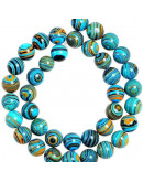 Malaquita sintética. Tonos azules. 10 mm diámetro. 1 mm perforación. 35 uds hilo aprox. 1 hilo.