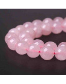 Cuarzo Rosa. Faceteada. 06 mm diámetro. 1 mm perforación. 60 unidades hilo aproximado. 1 hilo.