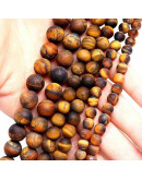 Ojo de Tigre. Mate. 12 milímetros diámetro. 1 mm perforación. 30 unidades hilo aproximado. 1 hilo. Ojo de Tigre. Mate. 12 milímetros diámetro. 1 mm perforación. 30 unidades hilo aproximado. 1 hilo.