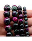 Epidote. 06 milímetros diámetro. 1 mm perforación. 60 unidades hilo aproximado. 1 hilo.