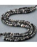 Piedra natural. Líneas negras. 08 mm diámetro. 1 mm perforación. 45 unidades hilo aprox. 1 hilo.