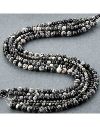 Piedra natural. Líneas negras. 08 mm diámetro. 1 mm perforación. 45 unidades hilo aprox. 1 hilo.