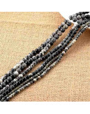 Piedra natural. Líneas negras. 08 mm diámetro. 1 mm perforación. 45 unidades hilo aprox. 1 hilo.