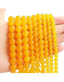 Calcedonia. Orange. 04 milímetros diámetro. 1 mm perforación. 90 unidades hilo aproximado. 1 hilo.