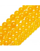 Calcedonia. Orange. 06 milímetros diámetro. 1 mm perforación. 60 unidades hilo aproximado. 1 hilo.